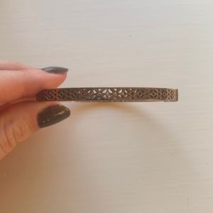 Rose gold fossil cut out bracelet